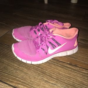 Pink Nike running shoes